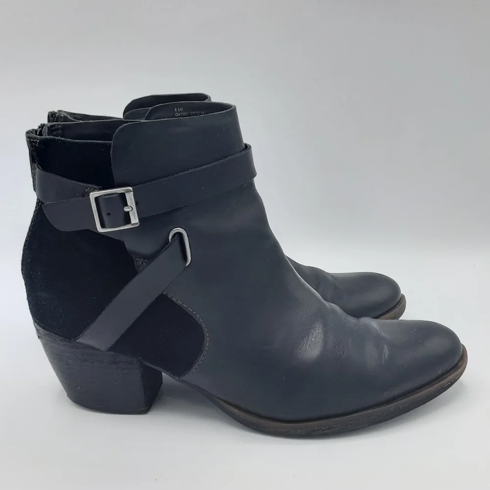 Korks Women's Rohit Black Leather Booties with Buckle Strap